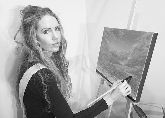 Australian artist, Hayley Byron, with a painting of a cloudscape in oil on canvas, titled Portal