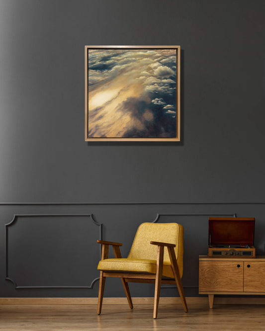 Original art, titled Cloudland, painted in oil on canvas, by Australian artist, Hayley Byron. The painting is a depiction of a cloudscape, from an aerial viewpoint. This image features the artwork in-situ, on a wall in an interior living room.