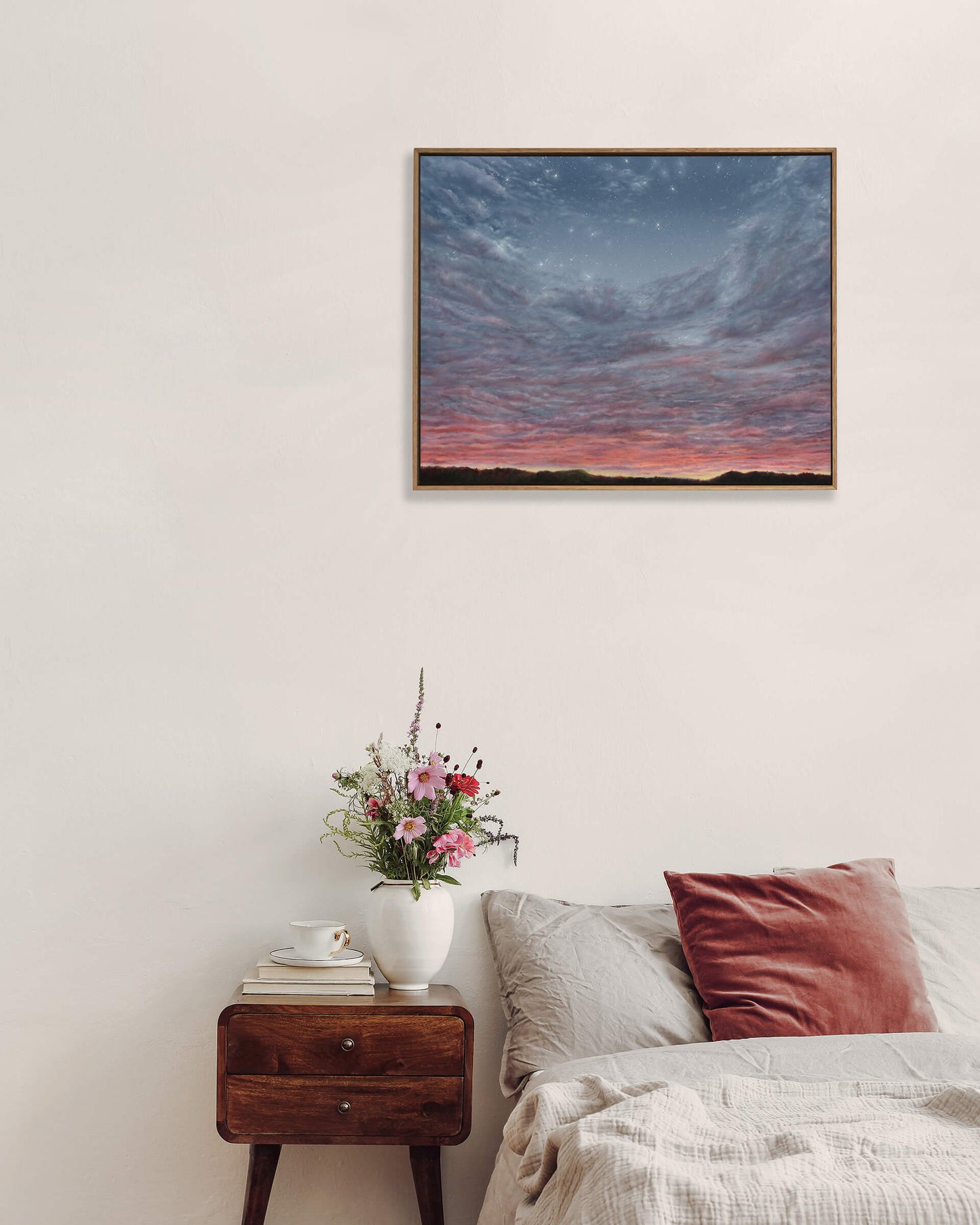 Original art, titled Portal, painted in oil on canvas, by Australian artist, Hayley Byron. The painting is a depiction of a landscape and an evening sky, in Rosalie, Brisbane. This image features the artwork in-situ in an interior bedroom.